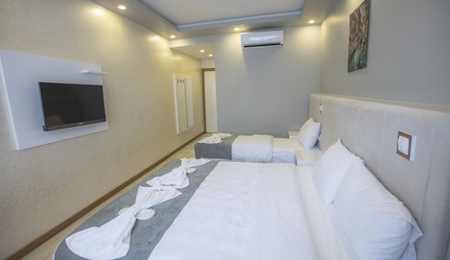 Habitación triple Deluxe