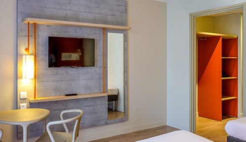Habitación triple, varias camas