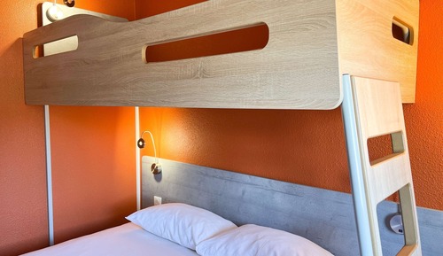Habitación triple, varias camas