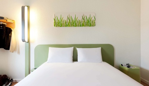 Habitación triple, varias camas