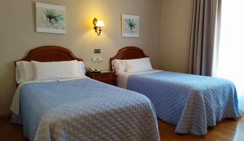 Habitación con 1 cama doble o 2 individuales