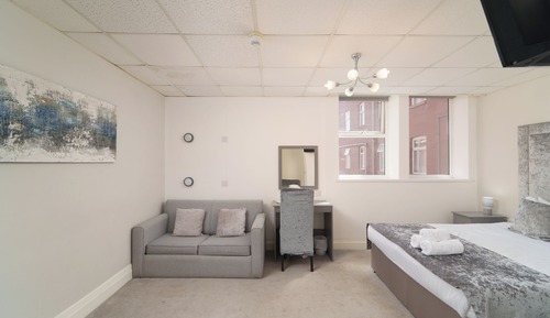 Habitación triple Premier, 1 cama doble con sofá cama