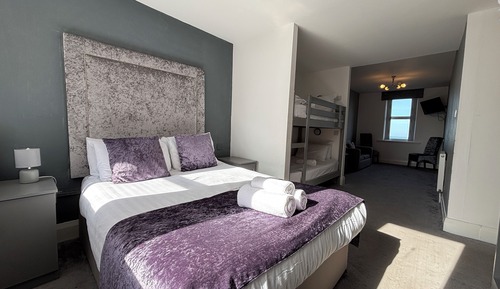 Habitación cuádruple Premier, varias camas, vistas al mar