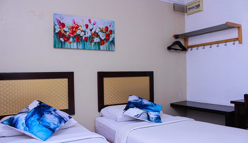 Habitación superior con 2 camas individuales, 2 camas individuales