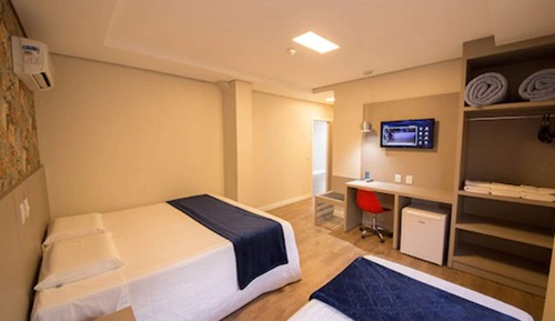 Habitación triple de lujo, varias camas