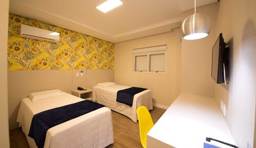 Habitación Deluxe con 2 camas individuales, varias camas