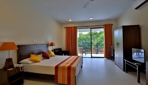 Suite Deluxe, 1 cama de matrimonio grande, vistas al jardín