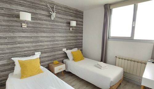 Habitación con 2 camas individuales