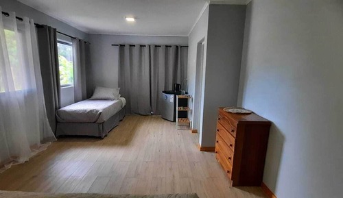 Habitación triple estándar, varias camas, terraza, en la zona del jardín
