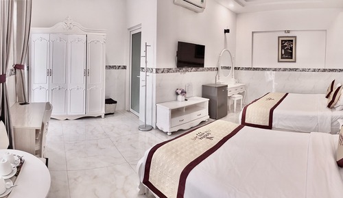 Habitación triple Deluxe