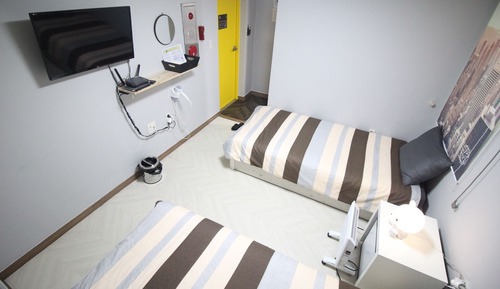 Habitación con 2 camas individuales