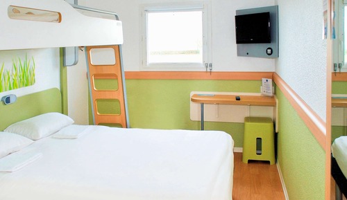 Habitación triple, varias camas