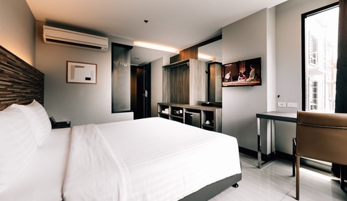 Habitación Deluxe con 1 cama doble o 2 individuales