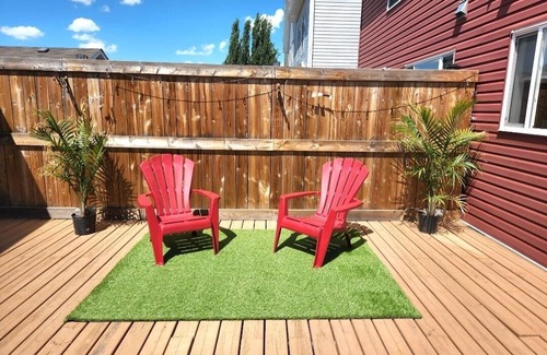 Southeast Edmonton Casa | House in Summerside with a huge patio and an extra tall garage