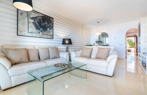 Rincón de la Victoria Apartamento | Comfortable, attractively located vacation home with shared pool and panoramic sea views.