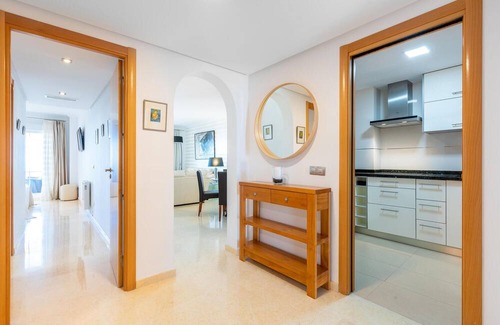 Rincón de la Victoria Apartamento | Comfortable, attractively located vacation home with shared pool and panoramic sea views.