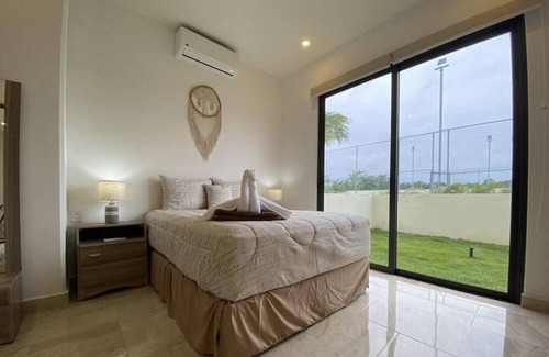 Ejidal Apartamento | Dog friendly 2BR w/backyard, pool, gym, bbq, pking