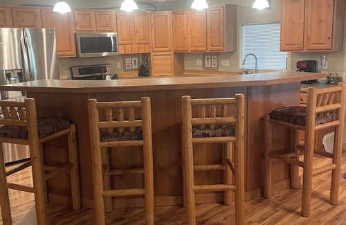 Joseph Cabina | Cozy cabin on a quiet dead end street with a large deck and outdoor kitchen