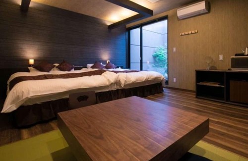 Oita Casa | Twin beds tatami onsen openair jacuzzi bath / Oita Ōita