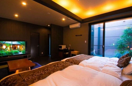 Oita Casa | Twin beds tatami onsen openair jacuzzi bath / Oita Ōita