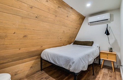 New Iberia Cabina | Modern A-Frame Cabin by Rip Van Winkle Gardens w/ Hot Tub & Fireplace!