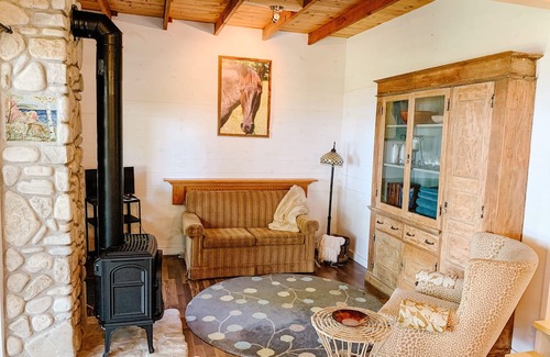 Gills Rock Cabaña | Waterfront 1 bedroom and loft cottage with small private pier on Garrett Bay