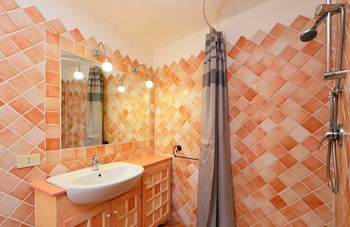 Trinita d'Agultu e Vignola Apartamento | Nice apartment for 5 guests with TV, terrace and pets allowed