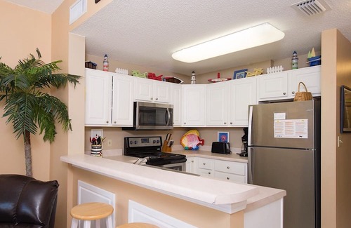 Fort Morgan Condominio | Fácil de libro condominio con todo lo necesario para unas vacaciones en la playa!