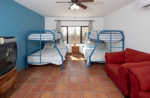 Las Conchas Casa | Arena y Sol - Vibrant two story home with colorful atmosphere