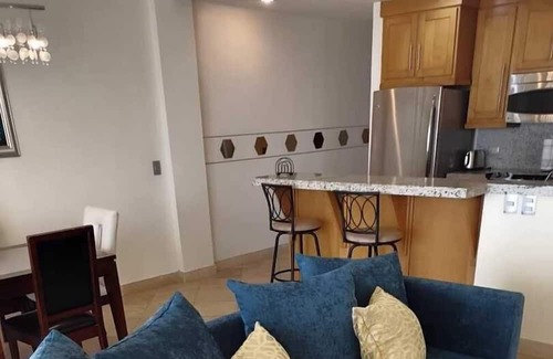 San Carlos Condominio | 1 Bedroom Playa Blanca 1104 Condo by RedAwning