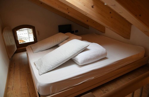 Canazei Cama Y Desayuno | Room with mezzanine in Canazei