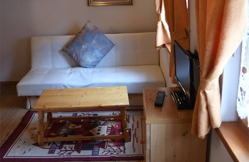 Canazei Cama Y Desayuno | Room with mezzanine in Canazei