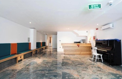 District 4 Hotel | Haven Hut Riverside Hotel