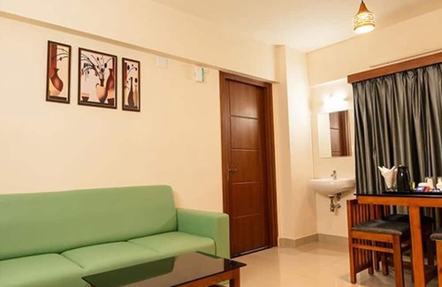 Kaloor Hotel | Fabhotel Jk Grand