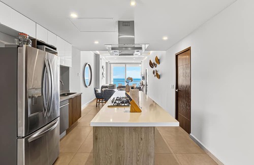 Las Glorias Apartamento | Beachfront 2BR - Pools & Balcony Views