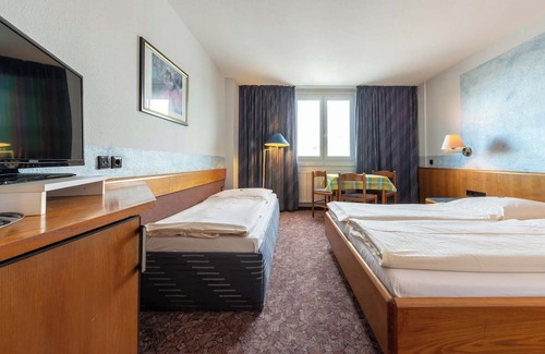 Korntal-Munchigan Cama Y Desayuno | enjoyHotel garni Korntal Stuttgart