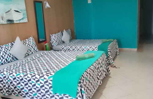 Bairro das Laranjeiras Hotel | Pés na Areia
