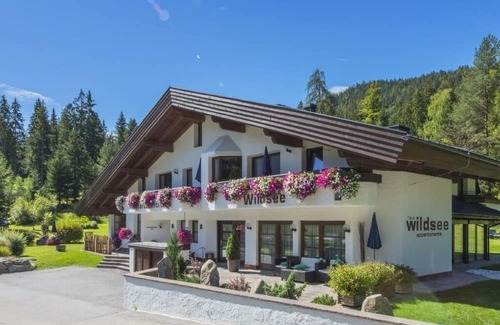 Reith bei Seefeld Apartamento | Vacation apartment directly on the lake, 2-room apartment SEEBLICK in Haus Wildsee