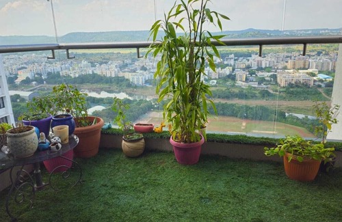 Nanded Apartamento | Luxurious 2-bedroom apartment in serene Pune with view, WiFi, AC, recliner