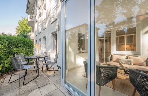 Zinnowitz Apartamento | Quartier am Kirchberg - 02 - quiet residential complex with conservatory and fireplace