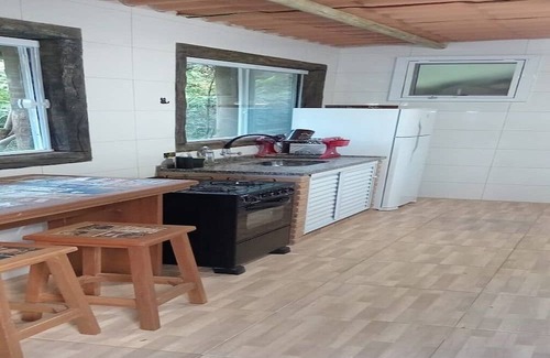 Praia da Fortaleza Condominio | Next to lush nature, suite with TV, kitchen, wifi, barbecue, and garage
