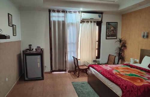 Chachian Hotel | Goroomgo The Woodz Dharamsala