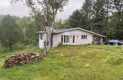 La Macaza Apartamento | Low cost apartment with river and hot-tub