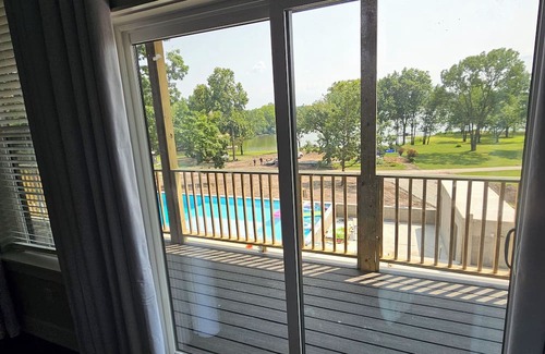 Grove Casa | Giant10-bedroom lakefront home with large pool, hot tub, and dock