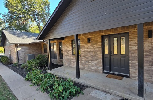 Grove Casa | Giant10-bedroom lakefront home with large pool, hot tub, and dock
