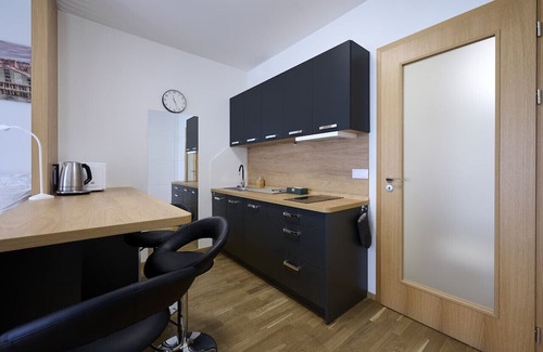 Prague 9 Apartamento | Garden Giggles: Ground-Floor Fun in the Sun