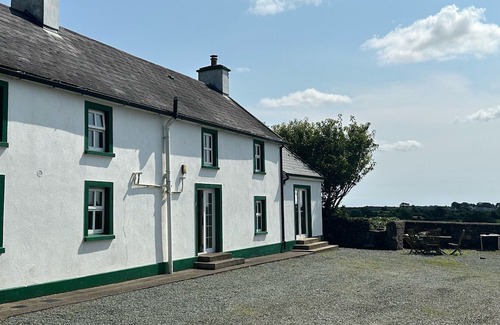 Hook Head Casa | Gorgeous renovated farmhouse with sweeping views of lush farmland!