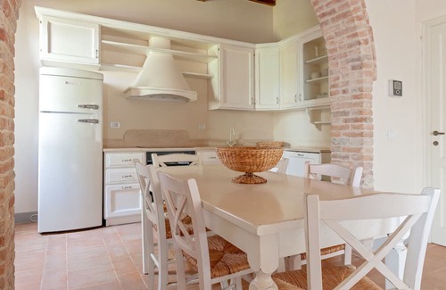 Toiano Casa | Holiday Home 'Casa Rossa - Campagna Toscana' with Shared Pool, Private Garden and Wi-Fi