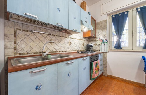 Giba Casa | Holiday Home 'La Casa Di Coccola' with Private Terrace, Wi-Fi and Air Conditioning