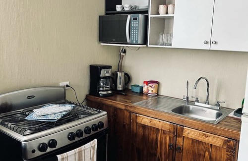 Villa Nueva Apartamento | Charming 3-bedroom apartment with AC and WiFi in enchanting Amatitlán